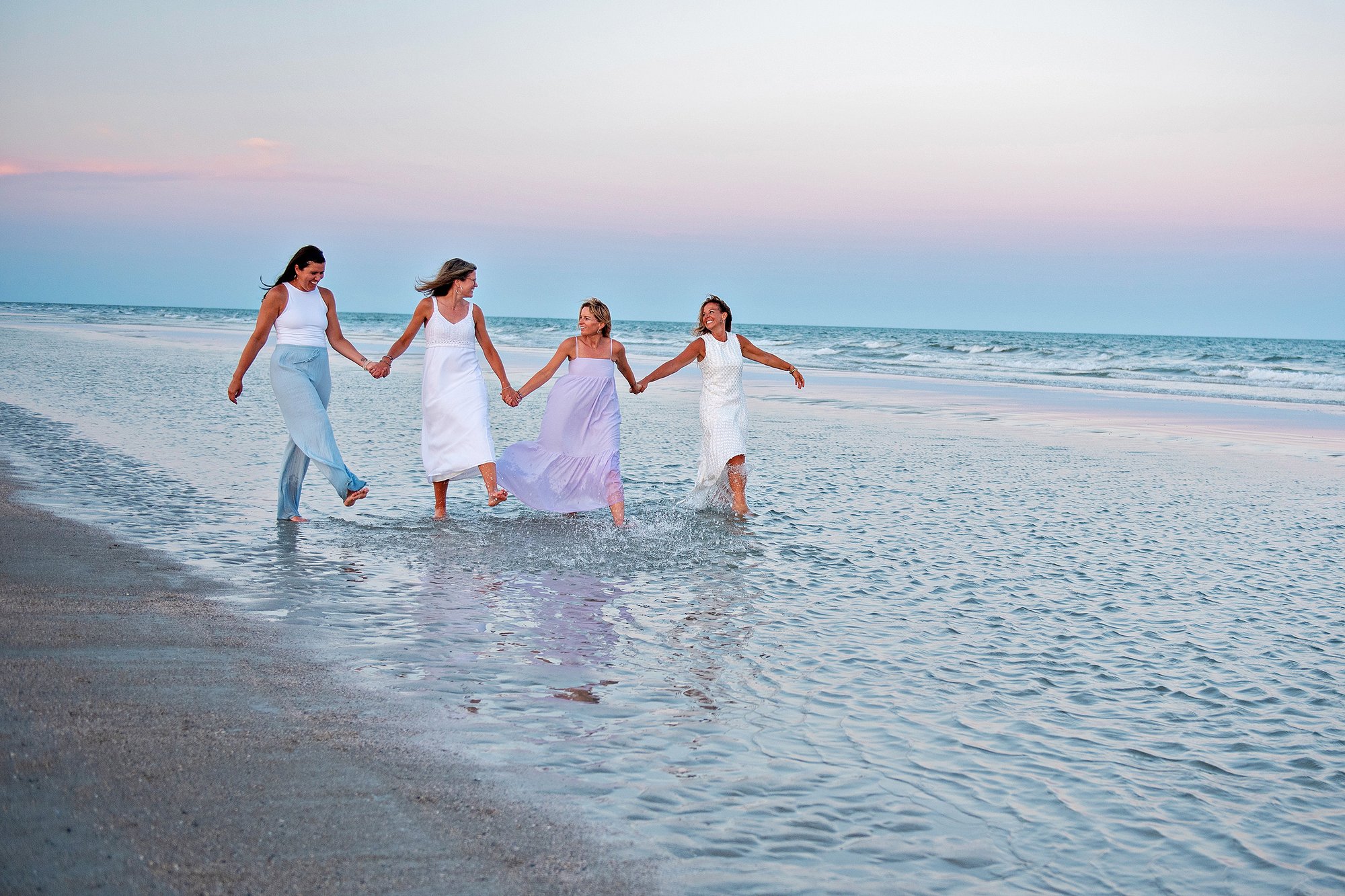 Yayas Holding Hands in Ocean